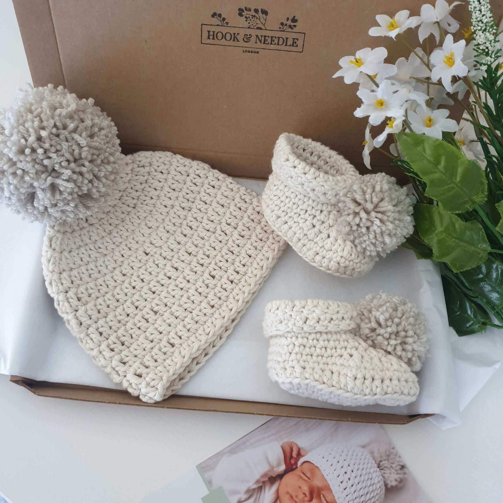 Cotton baby pom pom hat and booties cream