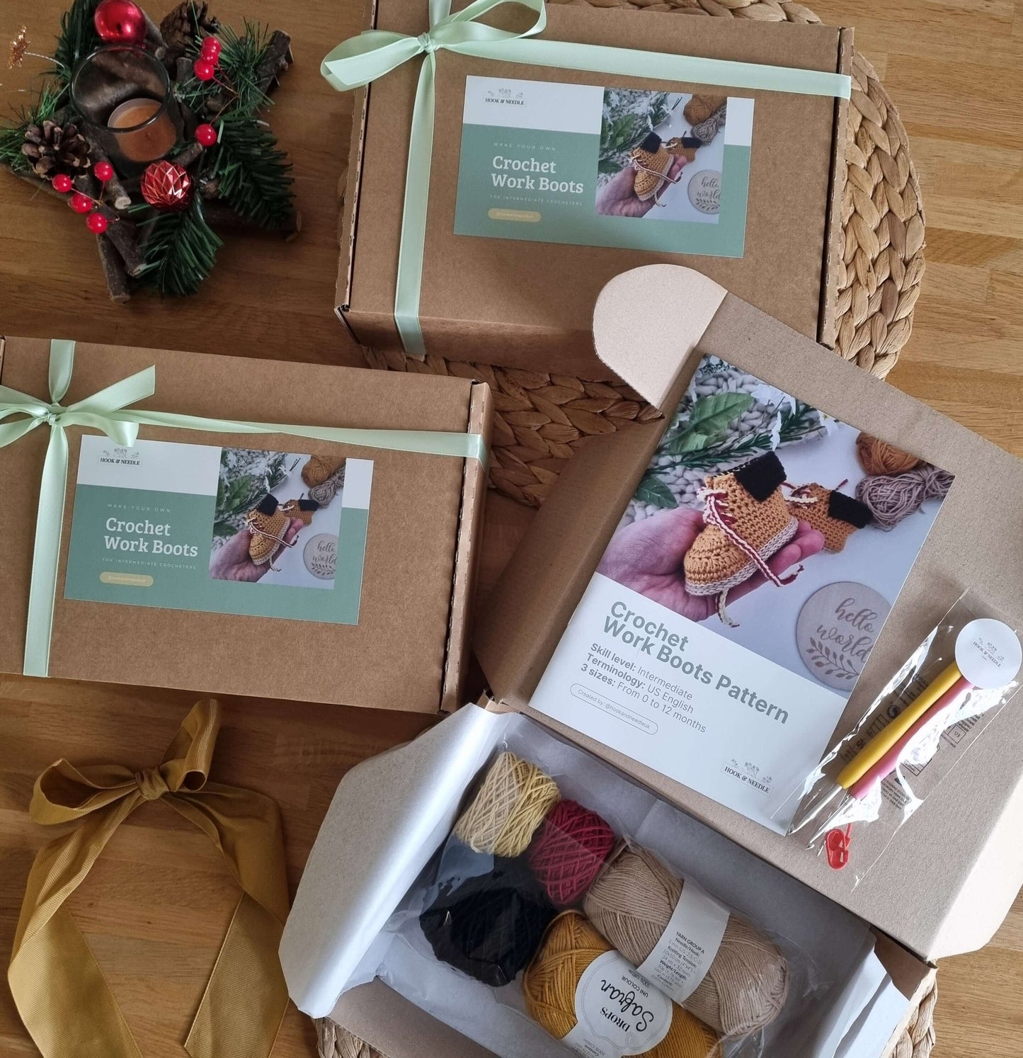 Knitting kit with yarn, needles, and pattern on a wooden surface