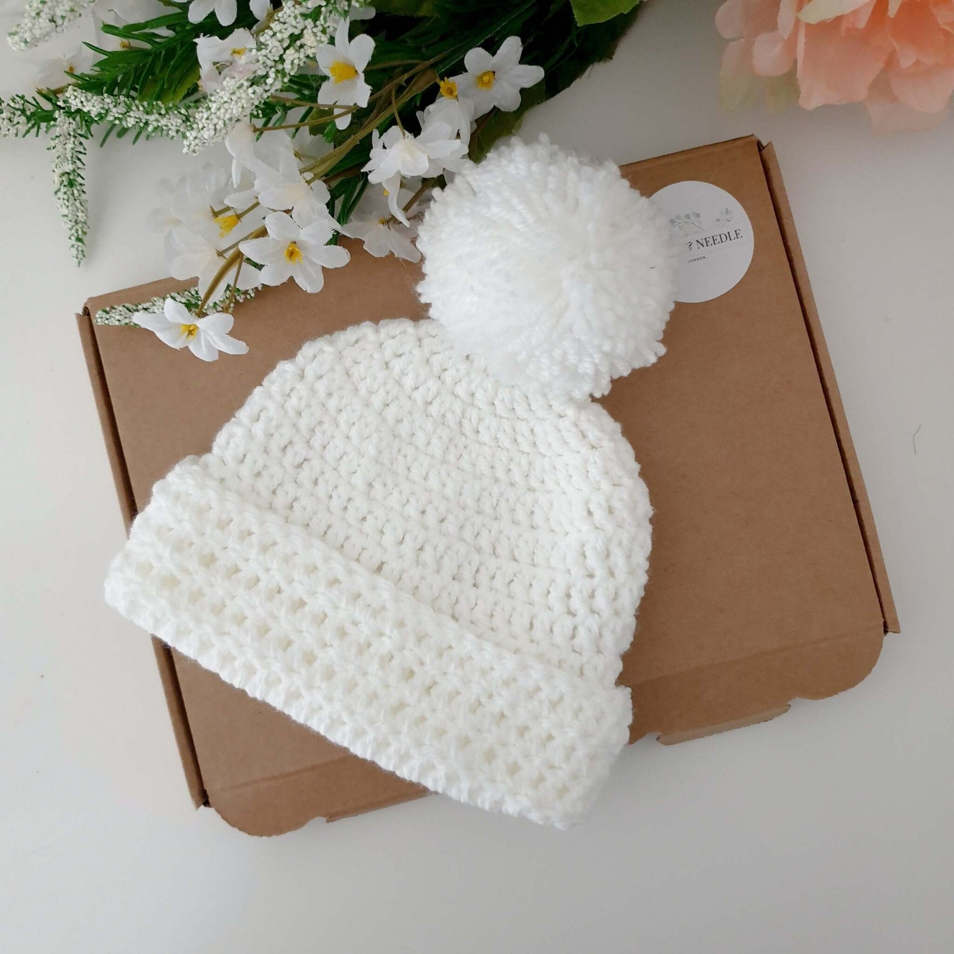 Acrylic baby pom pom hat white