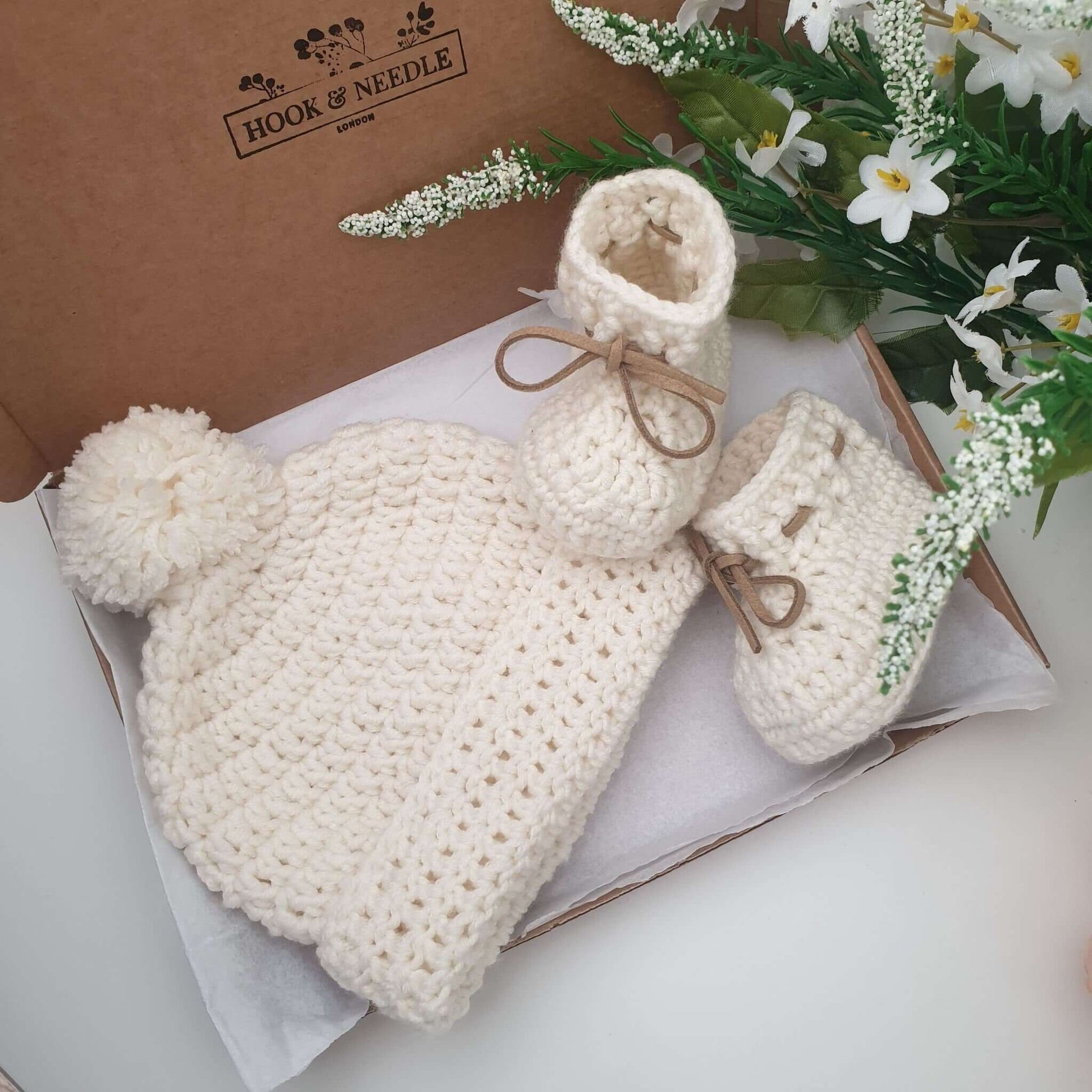 Merino wool baby hat and booties in cream